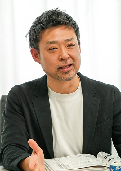 業務部審査課課長 中村篤司さん